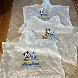 Three Disney Parks Ponchos-2 Adult and 1 Child